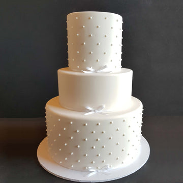Fondant covered wedding cake 3 tier – 2 x increased height 1 x standard height piping detail