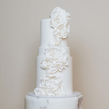 Cascading wafer paper roses and gold leaf wedding cake - - CakesDecor