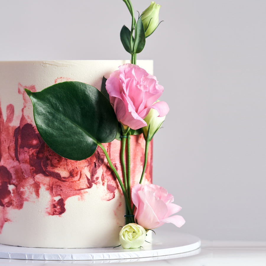 Abstract watercolour buttercream with floral detail