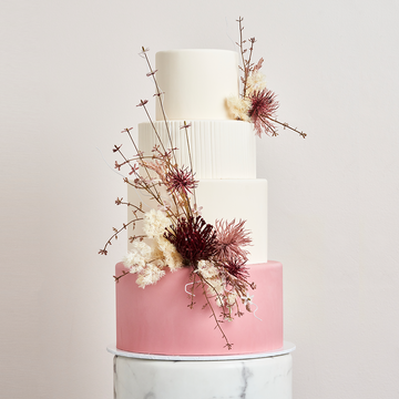 Fondant covered cake - 4 tier with a touch of blush and dried florals