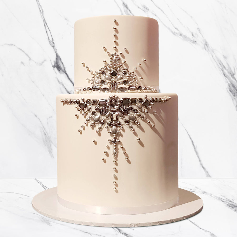 Fondant covered wedding cake with jewel details
