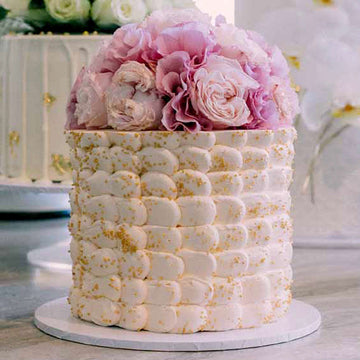Marshmallow effect buttercream wedding cake with florals