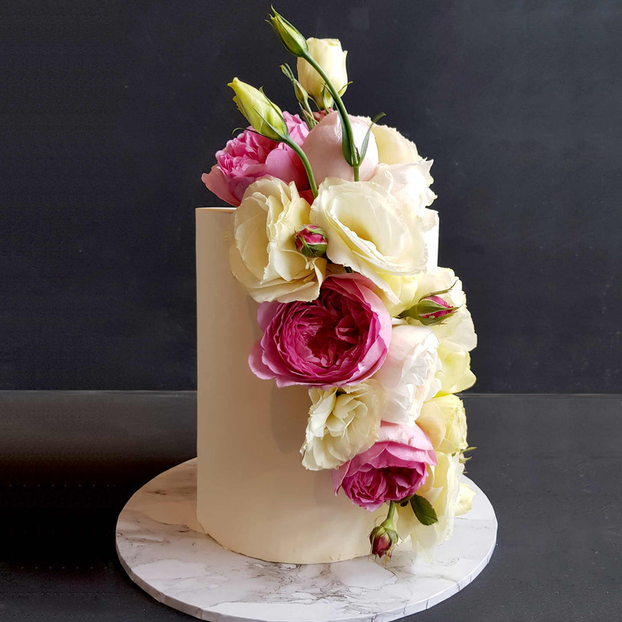 White chocolate ganache cake with cascading fresh florals
